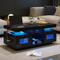 Couchtisch in Hochglanz Schwarz mit LED-Beleuchtung, Schrank, offenen F?chern und Lad